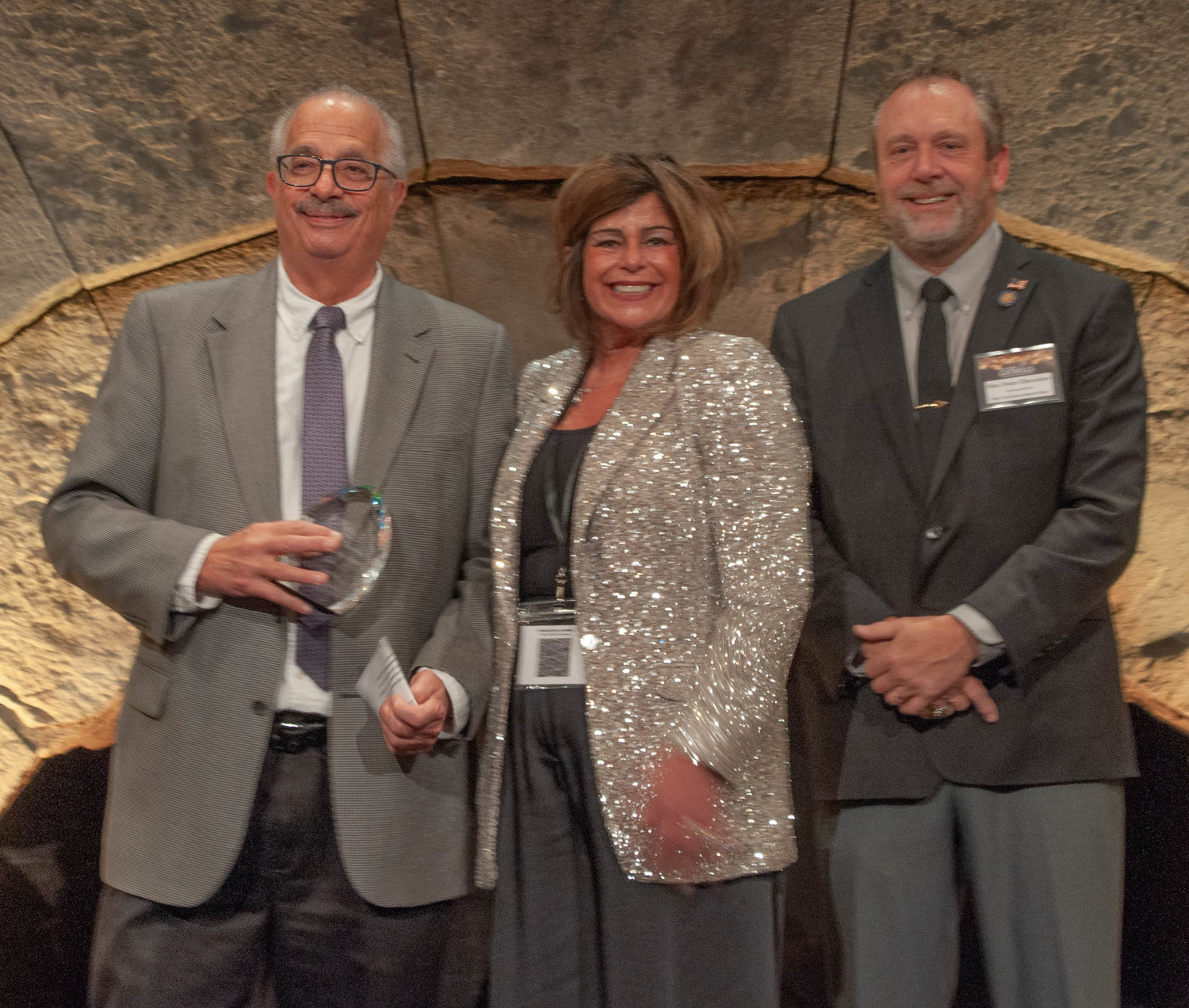 Paul Carlucci, left, seen here with SCVA president Roberta Byron-Lockwood and Sen. Peter Oberacker, received the STAR Award for individual achievement. The award honors his years of service as vice president of the Villa Roma Resort & Conference Center.  They were at the SCVA Hospitality Awards party held at Bethel Woods last week.